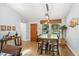 Dining room with table, chairs, and a front door at 878 W Timberland Trl, Altamonte Springs, FL 32714