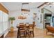 Dining room features a modern light fixture and fireplace at 878 W Timberland Trl, Altamonte Springs, FL 32714