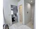 Bright bathroom connected to the main bedroom with a modern shower at 1309 Rebecca Dr, Haines City, FL 33844