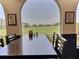 Comfortable dining area overlooking the golf course at 1309 Rebecca Dr, Haines City, FL 33844
