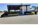 The Barn restaurant with indoor and outdoor dining, covered patio, and lush landscaping at 1309 Rebecca Dr, Haines City, FL 33844