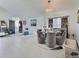 Bright open-concept living and dining area, featuring modern decor and natural light at 1309 Rebecca Dr, Haines City, FL 33844