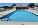 Community pool with sparkling blue water and plenty of space for relaxing and swimming at 1309 Rebecca Dr, Haines City, FL 33844