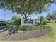 Southern Dunes Golf and Country Club sign with manicured landscape at 1309 Rebecca Dr, Haines City, FL 33844