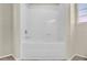 Bathroom featuring a bathtub and tile surround at 1321 Arbor Vista Loop # 101, Lake Mary, FL 32746