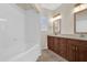 Bathroom with a dual vanity, soaking tub and window at 1321 Arbor Vista Loop # 101, Lake Mary, FL 32746