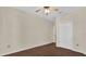 Bedroom with hardwood flooring, closet, and ceiling fan at 1321 Arbor Vista Loop # 101, Lake Mary, FL 32746