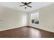 Bedroom with hardwood flooring, window, closet and ceiling fan at 1321 Arbor Vista Loop # 101, Lake Mary, FL 32746