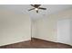 Wood-look tile bedroom with ceiling fan and walk-in closet at 1321 Arbor Vista Loop # 101, Lake Mary, FL 32746