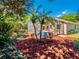 This backyard boasts mature landscaping, a screened-in patio, and creates a private and relaxing retreat at 1450 Chessington Cir, Lake Mary, FL 32746