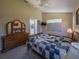 Spacious bedroom featuring a large window, neutral color scheme, and views to the pool area at 1450 Chessington Cir, Lake Mary, FL 32746