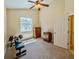 Bright bedroom with high ceilings, ceiling fan, natural light and standard closet at 1450 Chessington Cir, Lake Mary, FL 32746
