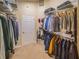 Walk-in closet featuring ample storage space with clothing racks and shelving at 1450 Chessington Cir, Lake Mary, FL 32746