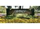 Heathrow entrance sign surrounded by colorful foliage and lush greenery at 1450 Chessington Cir, Lake Mary, FL 32746