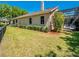 Well maintained home featuring stucco siding, green lawn, and mature landscaping at 1450 Chessington Cir, Lake Mary, FL 32746