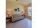Cozy sitting room with a neutral color palette, plenty of natural light, and tile floors at 1450 Chessington Cir, Lake Mary, FL 32746