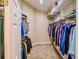 Spacious walk-in closet with ample shelving and rod space for organized storage at 1450 Chessington Cir, Lake Mary, FL 32746