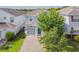 Beautiful two-story home with well-maintained landscaping and a paved driveway leading to the garage at 1628 Moon Valley Dr, Davenport, FL 33896