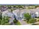 Lovely two-story home with well-kept landscaping, a paved driveway, and proximity to community amenities at 1628 Moon Valley Dr, Davenport, FL 33896