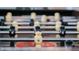 Close-up shot of a foosball table with black and cream-colored players at 1628 Moon Valley Dr, Davenport, FL 33896