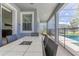 Covered lanai with dining area and view of the pool, offering a relaxing outdoor experience at 1628 Moon Valley Dr, Davenport, FL 33896