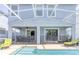 Backyard with pool, patio and lanai is perfect for outdoor relaxing and entertaining at 1628 Moon Valley Dr, Davenport, FL 33896