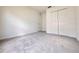 Bedroom with new carpet, closet, and fresh white walls; ready for personal touches at 1721 Teagan Ln, Winter Haven, FL 33884