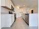 A modern kitchen with sleek countertops and stainless steel appliances at 1721 Teagan Ln, Winter Haven, FL 33884