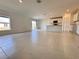 Bright and airy living area featuring tile floors, blending modern design with comfortable living at 1721 Teagan Ln, Winter Haven, FL 33884