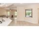 Open living space showcasing neutral tones and a seamless connection to the outdoor area at 19261 Quarterly Pkwy, Orlando, FL 32833