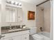 Bathroom featuring a granite vanity and tiled shower-tub combo at 200 St Andrews Blvd # 512, Winter Park, FL 32792