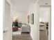 Inviting living room featuring an open layout and view into the bedroom at 200 St Andrews Blvd # 512, Winter Park, FL 32792