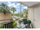 Relax on the screened patio with views of tropical landscaping and ample parking at 200 St Andrews Blvd # 512, Winter Park, FL 32792