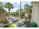 Relax on the screened patio with views of tropical landscaping and ample parking at 200 St Andrews Blvd # 512, Winter Park, FL 32792