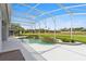 A screened-in pool with manicured landscaping and a serene water feature, creating a relaxing outdoor oasis at 2328 Warren Woods Dr, Orlando, FL 32835