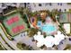 Aerial view of the community pool, playground, basketball and tennis courts at 2355 Silver Palm Dr, Kissimmee, FL 34747