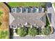 Aerial view showcasing townhome rooftops and private screened-in swimming pools at 2355 Silver Palm Dr, Kissimmee, FL 34747