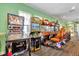 Bright arcade room featuring an array of exciting games for entertainment at 2355 Silver Palm Dr, Kissimmee, FL 34747