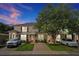 Charming townhome with well-maintained landscaping and ample parking at 2355 Silver Palm Dr, Kissimmee, FL 34747