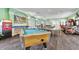 Fun game room with a pool table and multiple arcade machines at 2355 Silver Palm Dr, Kissimmee, FL 34747