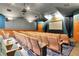 Home theater room featuring comfortable seating and a large screen at 2355 Silver Palm Dr, Kissimmee, FL 34747