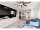 Second floor loft featuring comfortable seating, a large TV, and easy access to the rest of the floor at 2383 Regency Park Dr, Deland, FL 32724