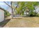 Home featuring a lush backyard with mature trees offering plenty of shade at 2417 Healy Dr, Orlando, FL 32818