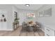 Inviting dining area with modern furniture, natural light, and stylish decor at 2417 Healy Dr, Orlando, FL 32818