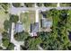 Aerial view of property, showing location, roof, lawn and proximity to the surrounding neighborhood at 271 W 11Th St, Chuluota, FL 32766