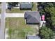Overhead view of the well-situated home, showcasing the roof, yard, and surrounding neighborhood at 271 W 11Th St, Chuluota, FL 32766