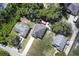 Aerial view of home with large backyard and mature trees at 271 W 11Th St, Chuluota, FL 32766