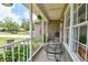 Inviting front porch featuring seating, plants, and decorations creating a welcoming outdoor space at 271 W 11Th St, Chuluota, FL 32766