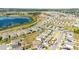 Aerial view of a residential area with homes and the community playground at 2837 Darlington Oak Ln, Ocoee, FL 34761