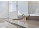 Bathroom sink featuring modern fixtures and quartz countertops at 2837 Darlington Oak Ln, Ocoee, FL 34761
